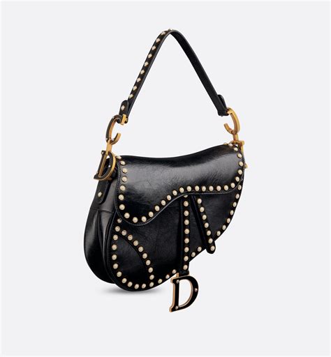 dior crinkle effect saddle bag.